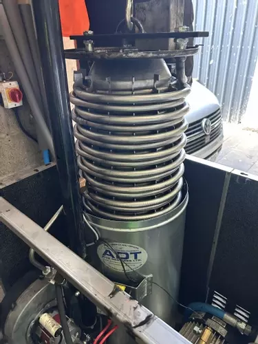 New boiler coil being installed into industrial hot pressure washer during emergency repair in Atherstone.